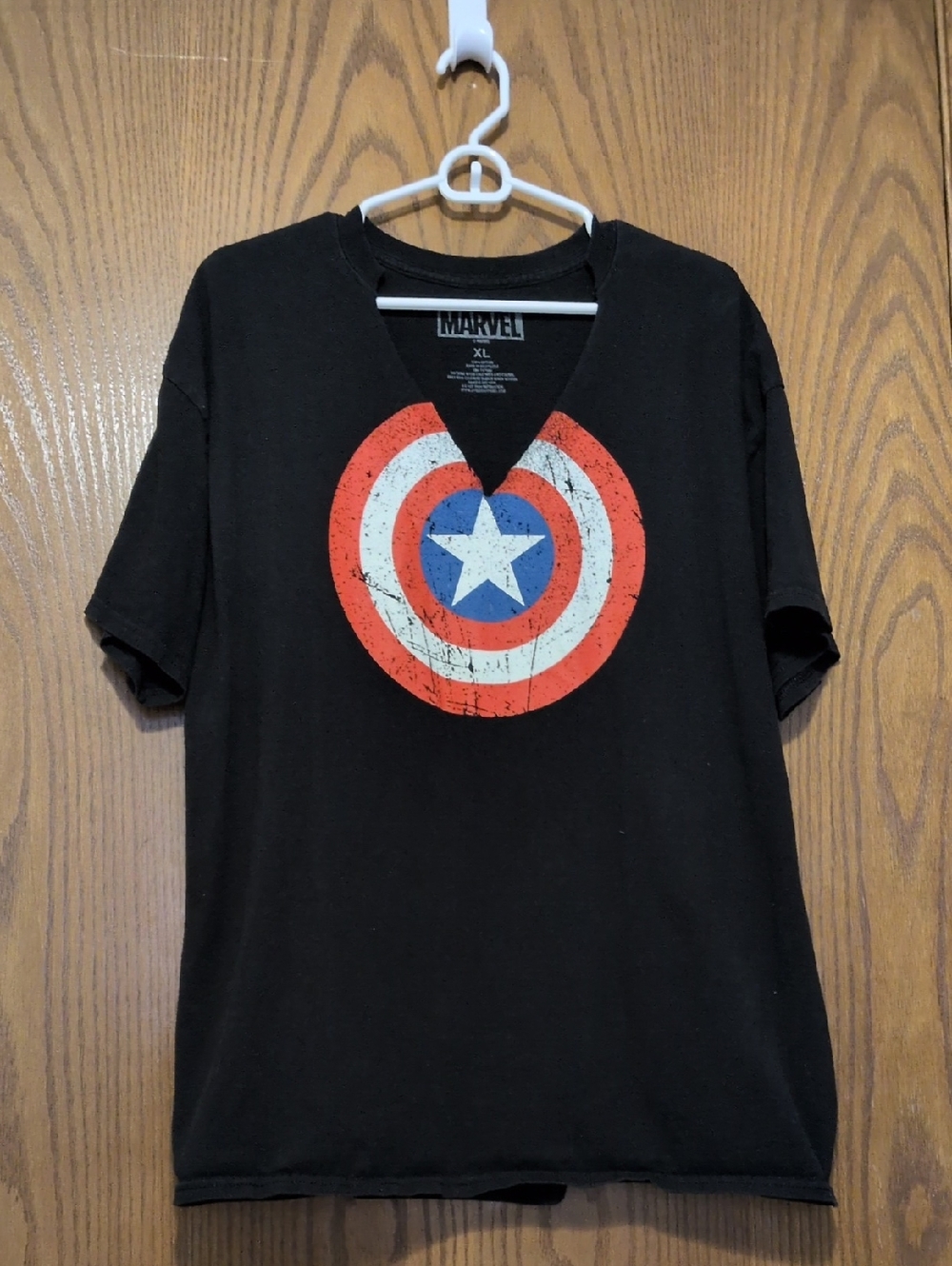 Marvel Black V‑Neck Short Sleeve Tee with Red, White & Blue Shield